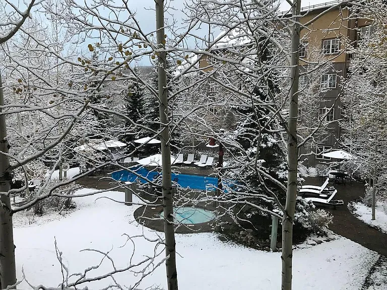 Heated walkways and insulated pool covers keep the hot tub and year-round heated pool comfortable at all times.
