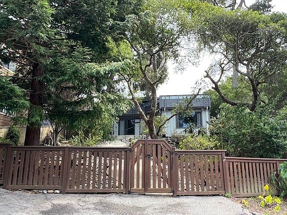 Front of house with privacy fenced