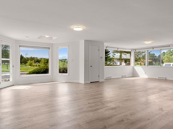 Lots of windows allowing natural sunlight pour in. New LVT luxury flooring, new paint throughout, and new carpet in all bedrooms.