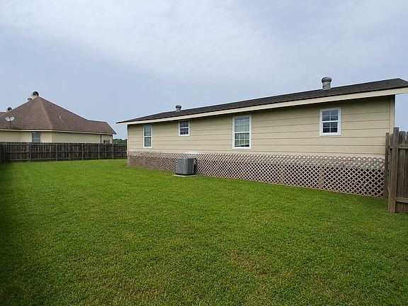 Backyard View from double swinging gate entrance