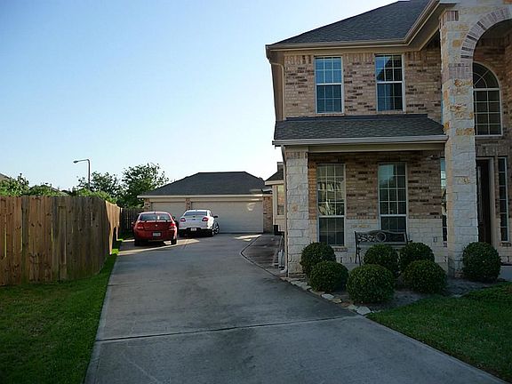 View of Driveway with 3 car garage