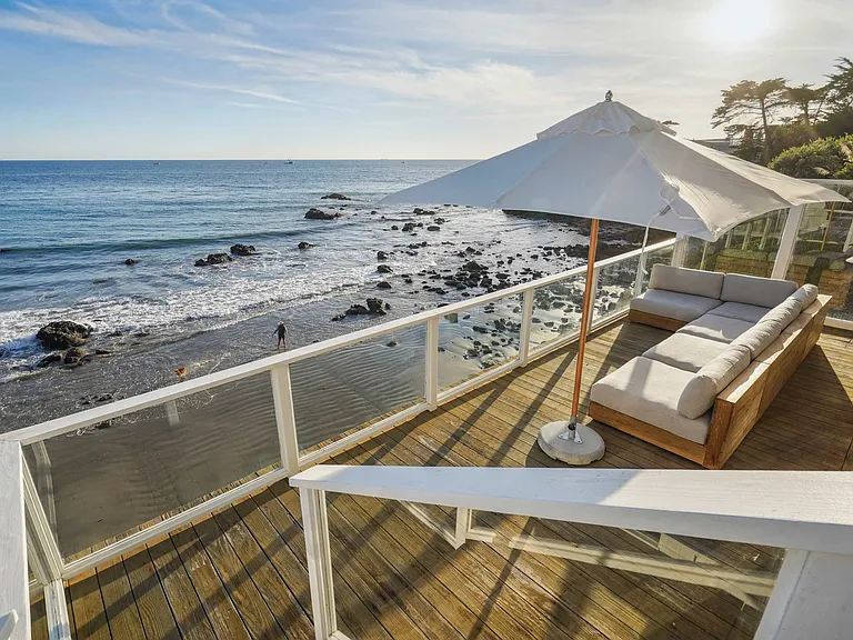 Relaxation finds new meaning by the sea.