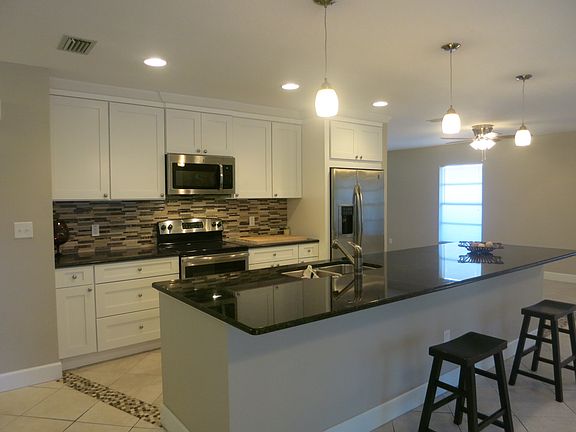4th image of 6916 Date Palm Ave S
