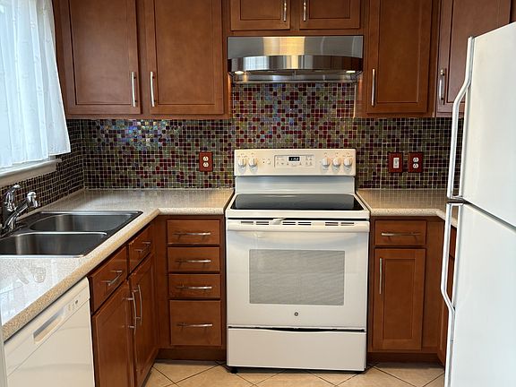 Nice updated kitchen with quartz countertops. All appliances included.