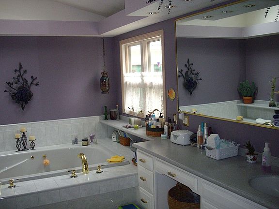 masterbath includes fun tub for 2, shower, corian counters