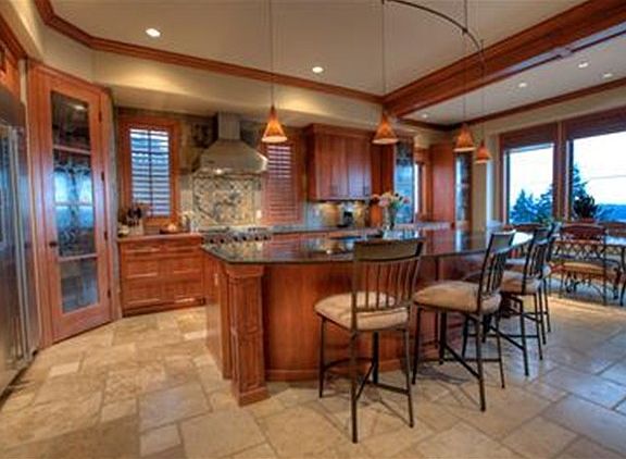 Truely a Gourmet Kitchen with a slab granite island, walk-in pantry, stainless steel appliances including two Viking ovens; one thermal convection and one professional oven with a 6 burner gas cook-top.