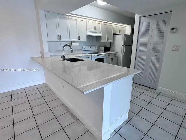 8600 SW 212th St #308 — Photo 2