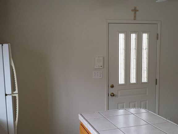 From the kitchen to the front door.