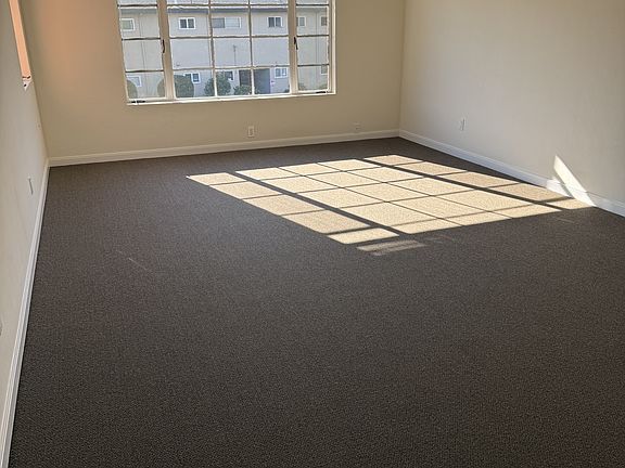 Living room with two windows for natural lighting