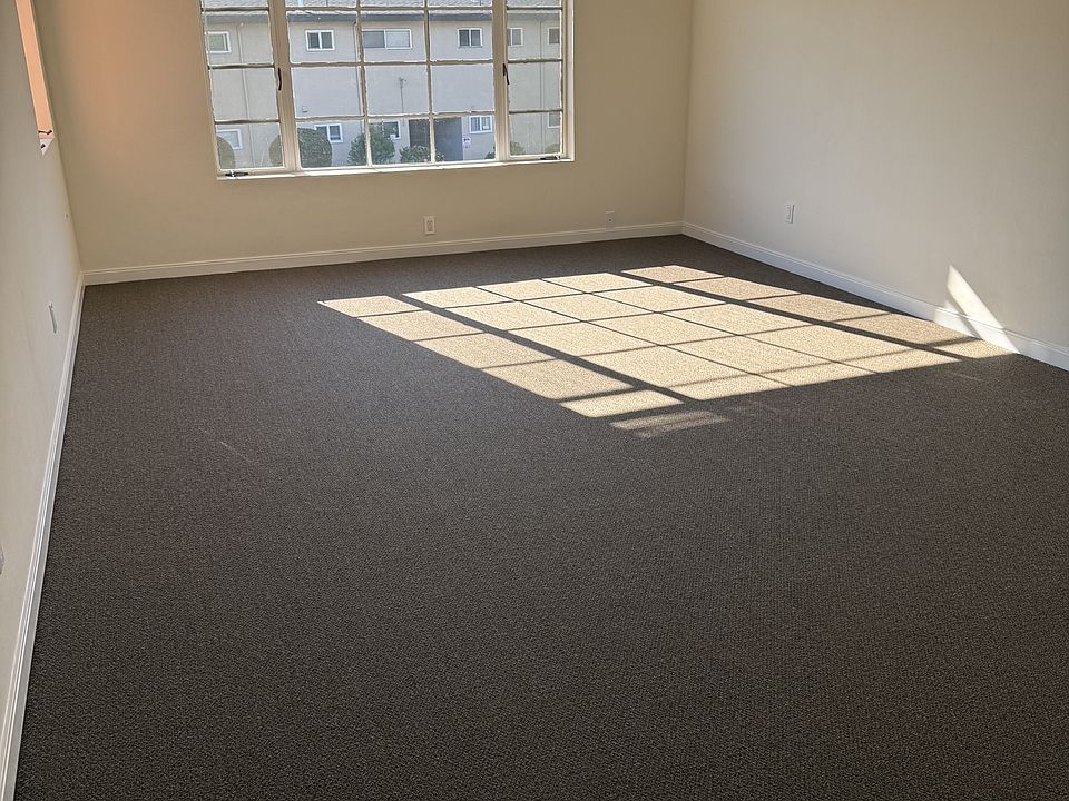 Living room with two windows for natural lighting