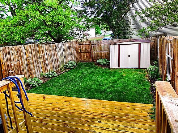 Fenced in backyard & deck