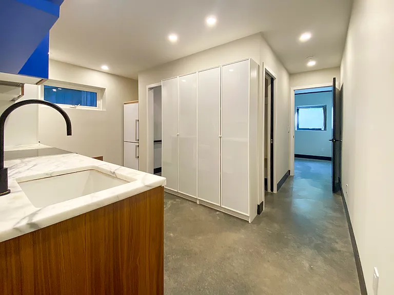 Kitchen with view to bedroom