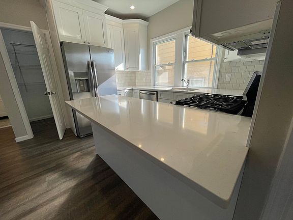 Kitchen with large pantry to left