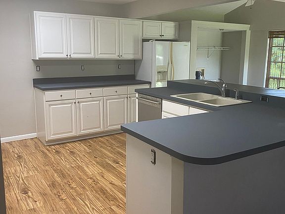 New flooring in kitchen, dining and hallways