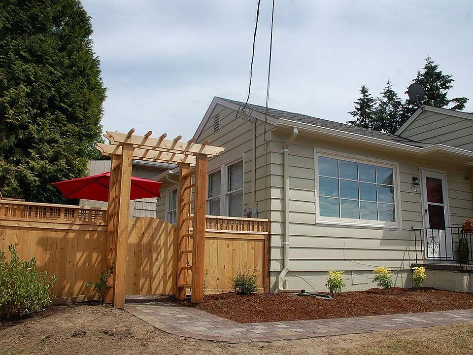 one bedroom side of a newly remodeled duplex with fenced yard and private patio.