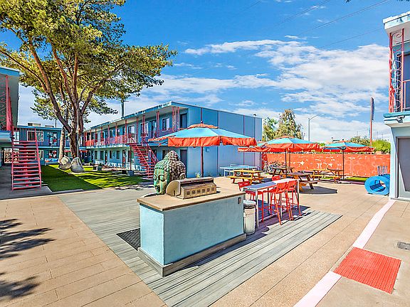 The Neon Outdoor BBQ Area