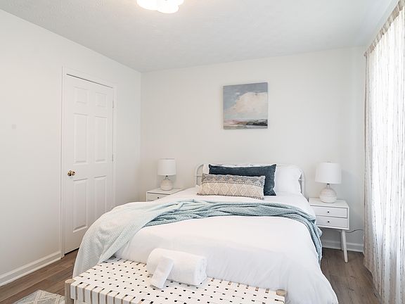 Queen bedroom with private workspace