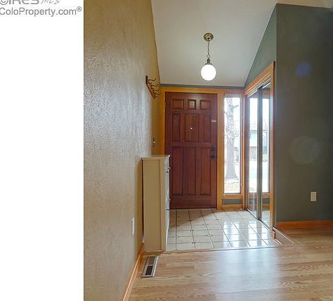 Formal entry with tile floor