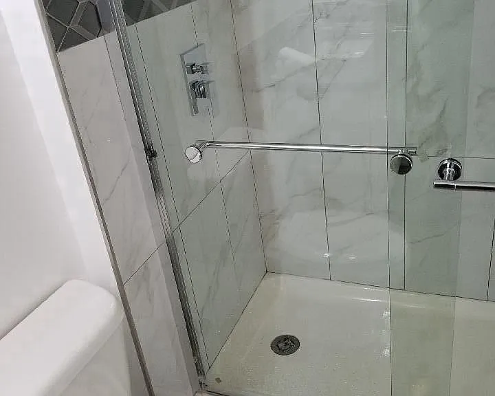 Marble Shower with exotic backsplash