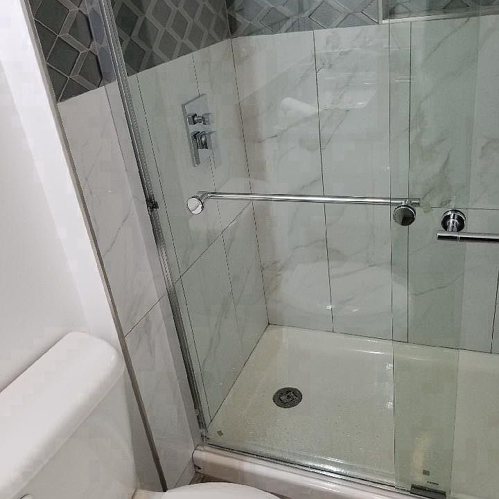 Marble Shower with exotic backsplash