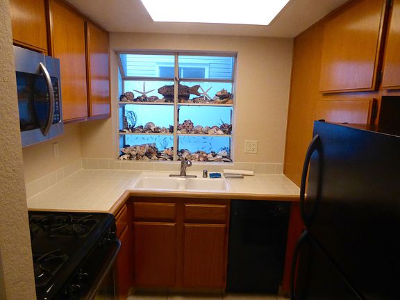Kitchen with gas range and dishwasher