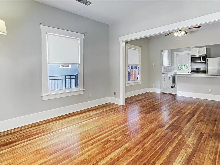 View from living room to dining and kitchen