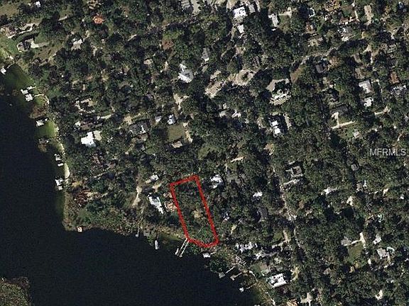 Property covers 1/2 city block with 145 ft of lakefront across. Bird Island sanctuary is at photo lower left.