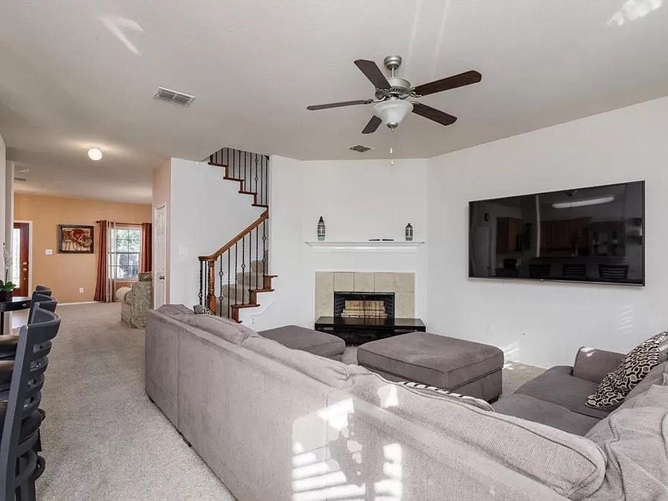 Spacious family room and a fireplace.