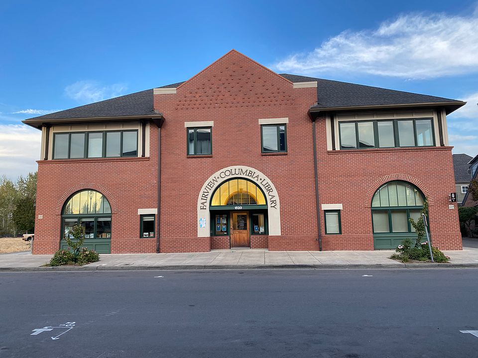 Exterior. Unit is on the second and third floor of the back side of the building.