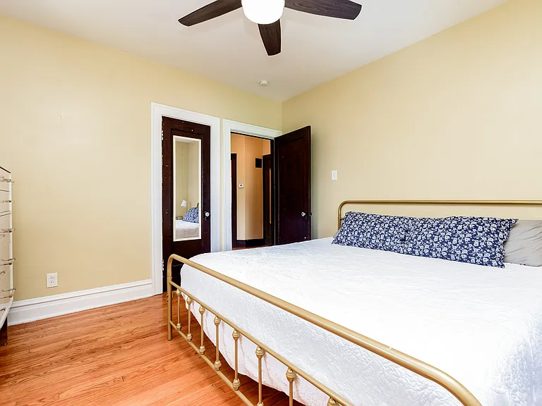 Back Bedroom, pictured is a kingsize bed, closet