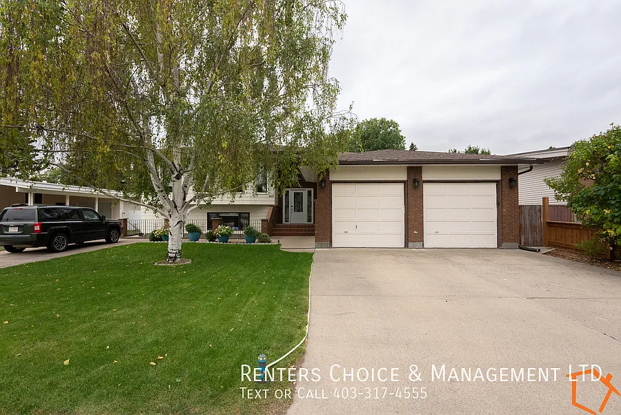3 bedroom Main Floor With Attached Garage, Utilities Included — Photo 1