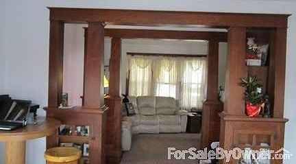 Dningroom looking at livingroom
						:
						Both the diningroom and livingroom have built in shelves