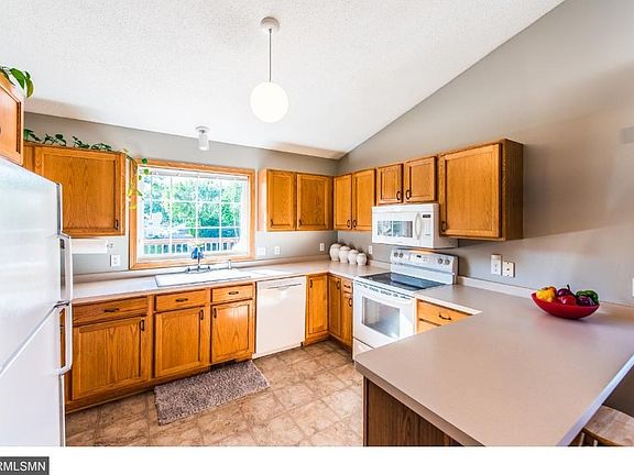 Sun drenched kitchen with tons of counter space.