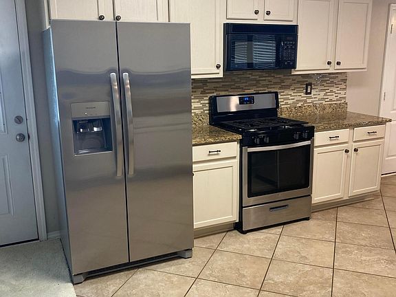 Kitchen with new refrigerator