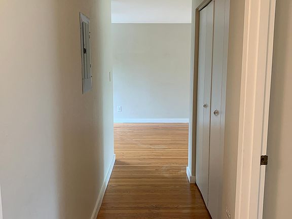 Entry hallway and laundry / hall closet