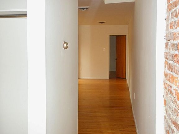 looking back at rear bedroom