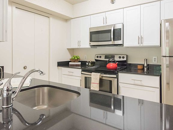 Kitchen with Energy Star Stainless Steel Appliances and Granite Countertops