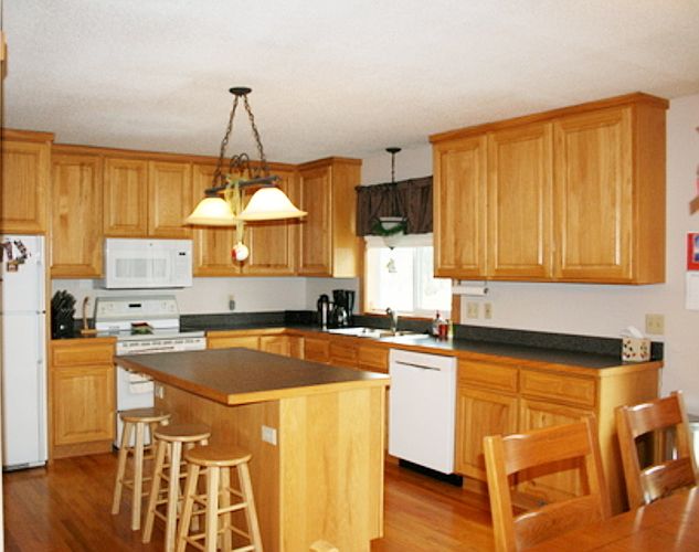 Updated kitchen with pantry and island. Newer dishwasher and microwave.