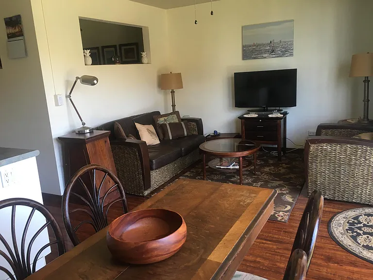 Large dining table/open concept roomNotice open window into