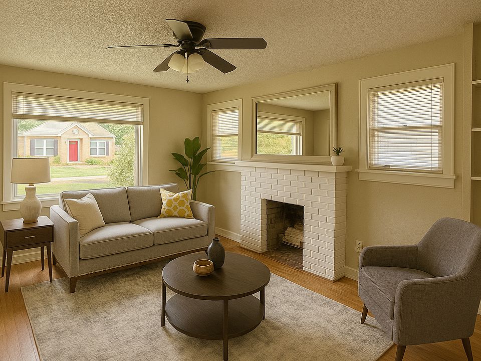 NIce sized living area with lots of natural light. Furniture is staged