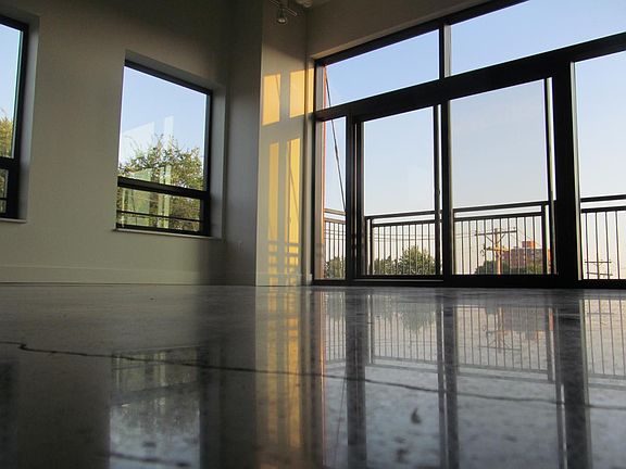 Large windows and high ceilings provide lots of natural ligh