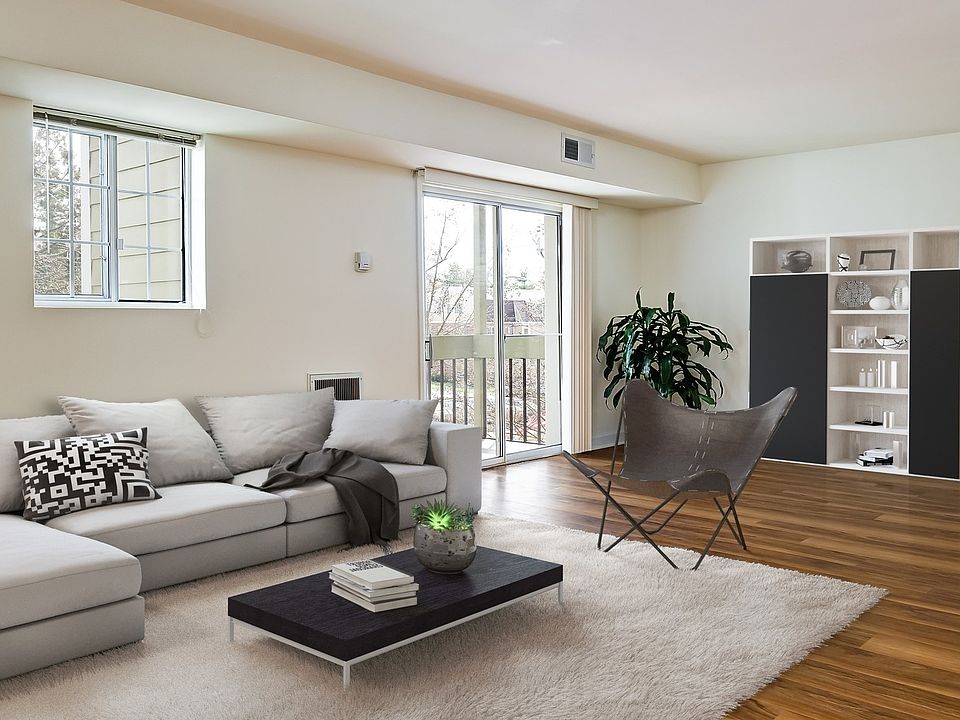 Spacious living room with vinyl wood flooring