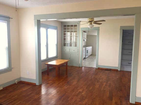 Built-ins, original and just refinished hardwood floors.