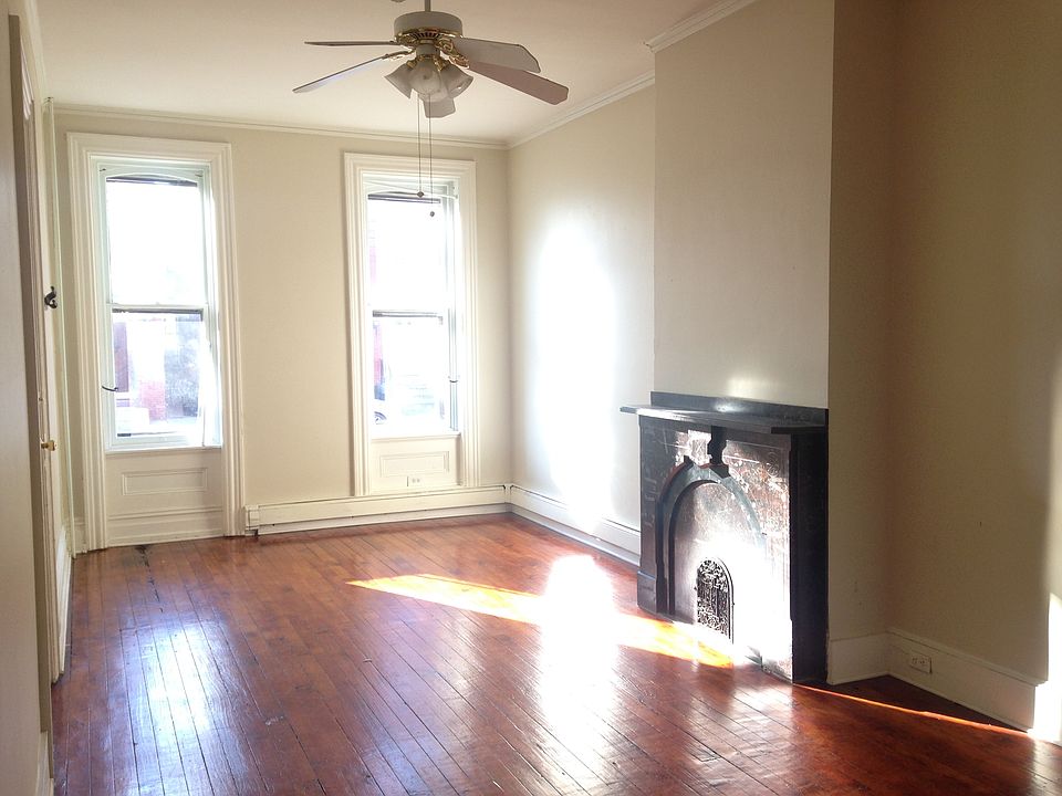 Living Room-large room w/ fireplace mantle