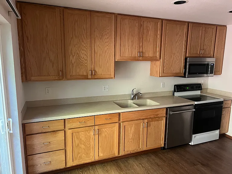 Kitchen - solid surface countertop, dw, range/microhood