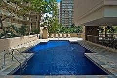 One of the two available pools and recreation/grilling areas