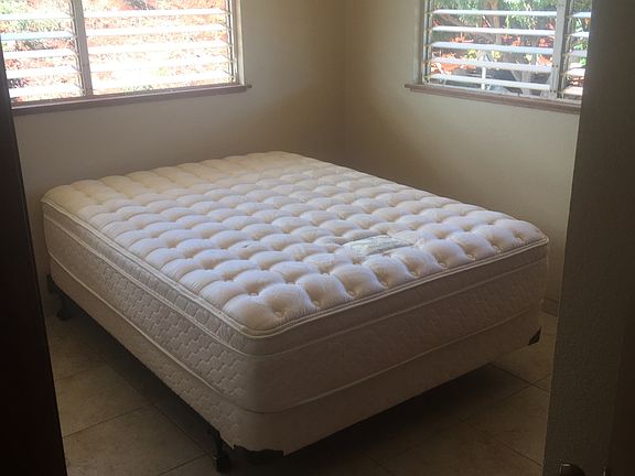 Queen bed in room