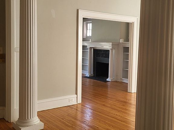 Entry looking into living room and den