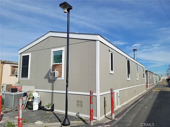 3rd image of 12265 Woodruff Ave Spc 64