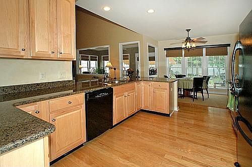 Kitchen facing sitting area